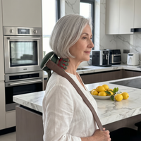 Bionic kneading massager positioned around the neck for relaxation