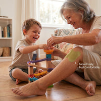 Herbal Wellness Patch applied to the knee in a home setting