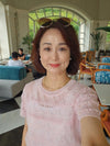 Mei C.